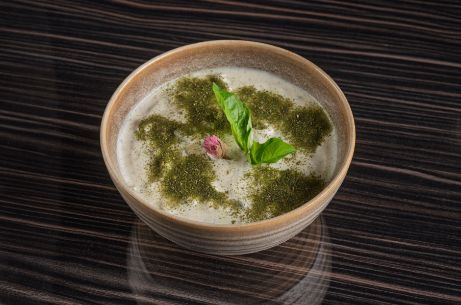 Persian Mast O Khiar yogurt and cucumber dip garnished with dried mint
